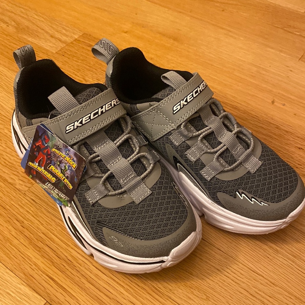 Sketchers Brand new boy tennis shoes. Size 13.5.
